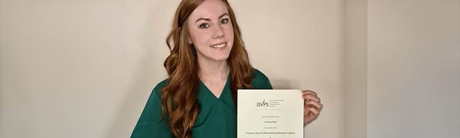 Catriona Muir RVN with her medical nursing certificate from ISVPS