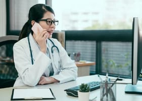 A vet talks to one of our CPD Advisors on the phone for free veterinary careers advice