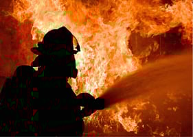 A firefighter controls a fire - elite teams can teach us a lot about our own profession