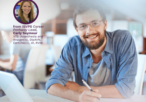 A veterinary nurse sits at a desk considering their vet nurse CPD